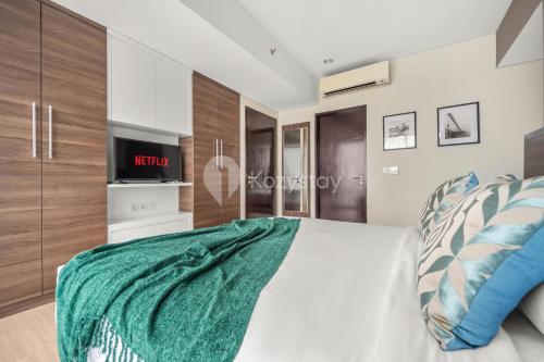 Katil atau katil-katil dalam bilik di Sonata by Kozystay - Pondok Indah