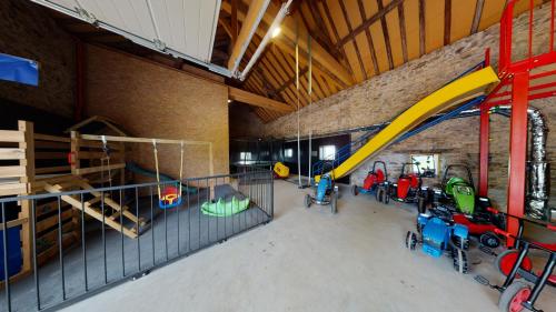 an overhead view of a play room with a slide at Ferienhof A&B Wellness Villa 6 personen in Bullange