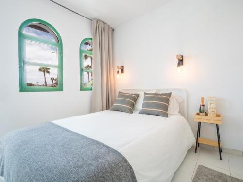 Ένα ή περισσότερα κρεβάτια σε δωμάτιο στο Apartamento Bungalow Maspalomas
