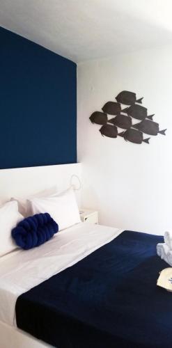 Postel nebo postele na pokoji v ubytování Rigas Rooms