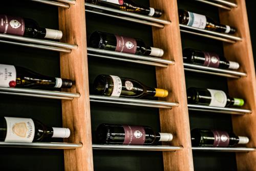 a bunch of wine bottles in a wine cellar at Hotel de Grote Zwaan in De Lutte