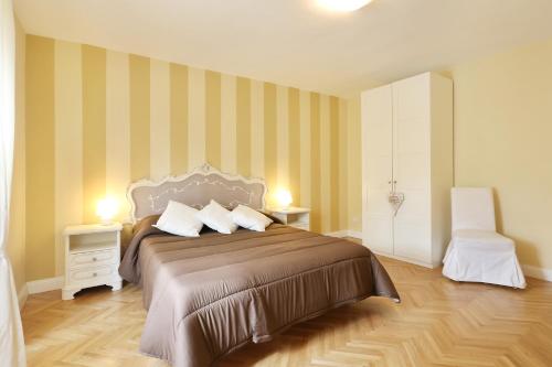 Ένα ή περισσότερα κρεβάτια σε δωμάτιο στο Flora - Sweet Dreams in Florence