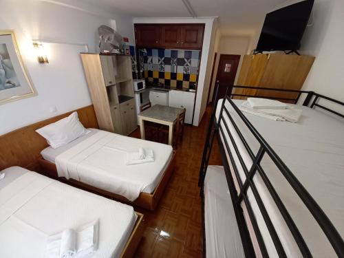 Łóżko lub łóżka w pokoju w obiekcie DBV Guesthouse