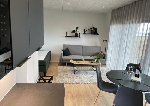 Posezení v ubytování SØGAARDEN - Hotel & SøCamp