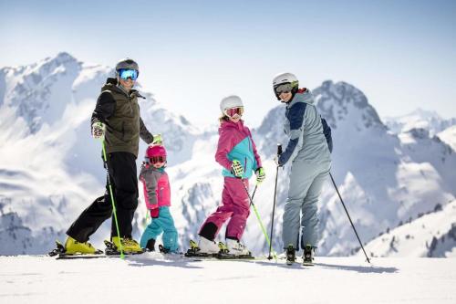 a group of people on skis on a mountain at Hausbergerhof Gästehaus Ainberger in Brixlegg