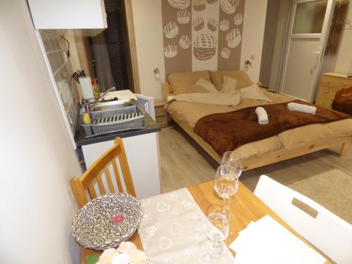 Katil atau katil-katil dalam bilik di Pogácsás Apartman