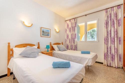 Katil atau katil-katil dalam bilik di Villa Del Mar Mondrago