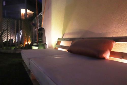 a bed with a pillow on it in a room at Finca Olivar de Castilla - Sun&Colors in Segovia