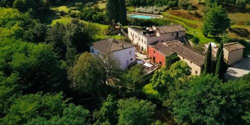 an aerial view of a house in a forest at Borgo Grondaie in Siena