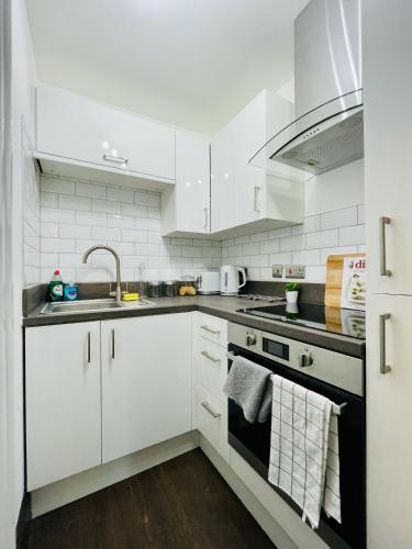 Η κουζίνα ή μικρή κουζίνα στο Cube Apartments