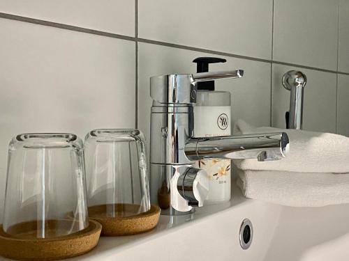 a kitchen counter with a blender on a sink at Borg Travel Center in Pori