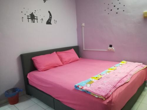 Łóżko lub łóżka w pokoju w obiekcie 30 Guest House