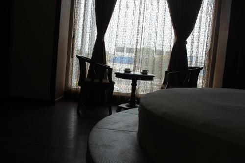 Postel nebo postele na pokoji v ubytování Hotel Sarvoday & Restaurant