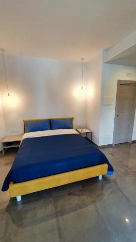Una cama o camas en una habitación de WeRooms