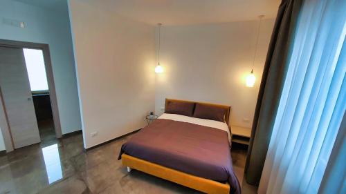 Una cama o camas en una habitación de WeRooms