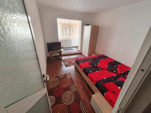 En eller flere senge i et værelse på Apartament Nero