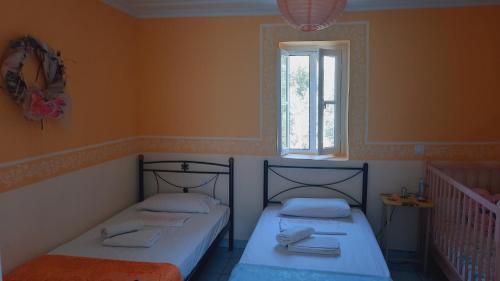 A bed or beds in a room at Villa Thea