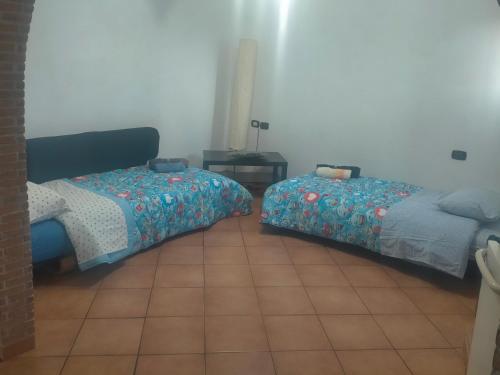 Ein Bett oder Betten in einem Zimmer der Unterkunft Civico Ventitre