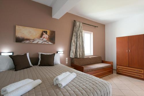 A bed or beds in a room at Mari Helen