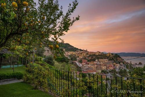 a view of the city of positano at sunset at Palazzo Suriano Heritage Hotel in Vietri sul Mare