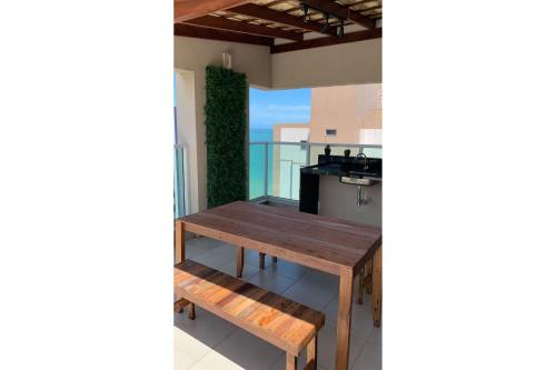 Cobertura Duplex Encantadora com jacuzzi Privativa Vista marにあるキッチンまたは簡易キッチン