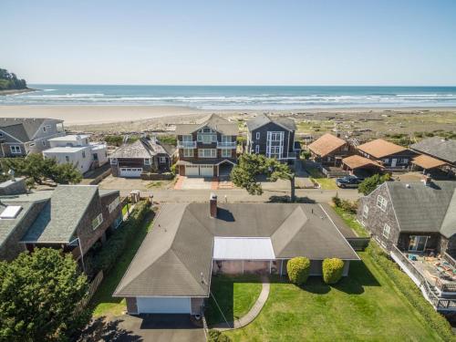 an aerial view of a houses and the beach at Surfers Cove in Seaside