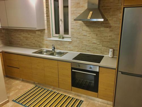 Kuchyňa alebo kuchynka v ubytovaní Casa Mersini