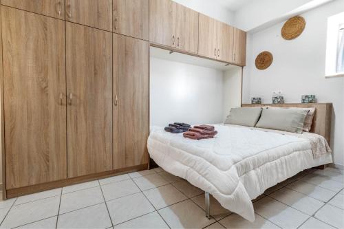 Postel nebo postele na pokoji v ubytování Stylish Old Town Apartments