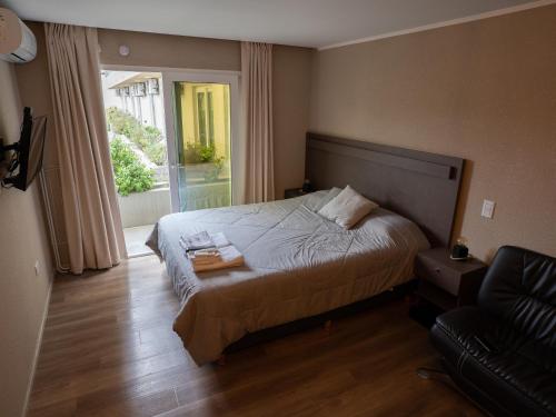 Ένα ή περισσότερα κρεβάτια σε δωμάτιο στο ¡Monoambiente exclusivo c/ pileta en Zona Playa!
