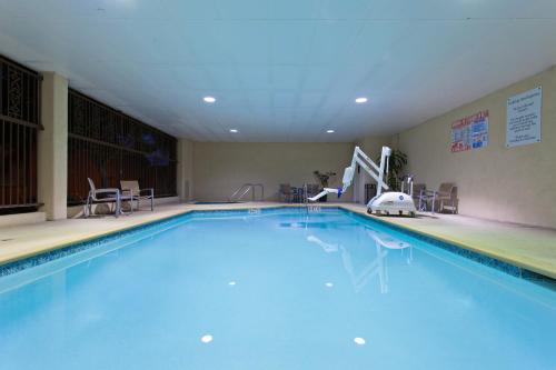 a large swimming pool in a hotel room at Holiday Inn Express Hotel & Suites Hermosa Beach by IHG in Hermosa Beach