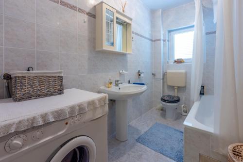 Koupelna v ubytování Apartment Peyo