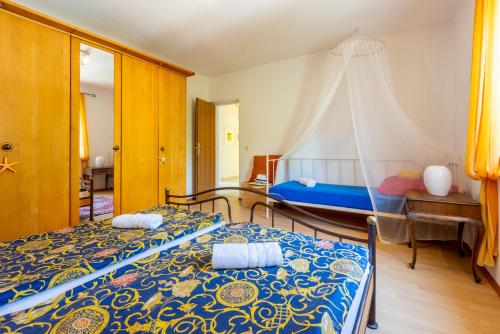 Postel nebo postele na pokoji v ubytování Apartment Peyo