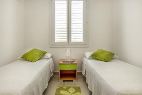 Postel nebo postele na pokoji v ubytování Le Perseidi Eco Home San Lorenzo