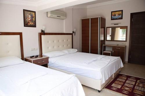 Katil atau katil-katil dalam bilik di Can Apartments