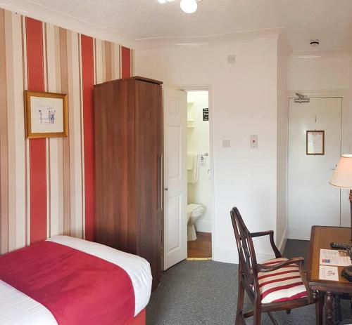 Una cama o camas en una habitación de Annabelle Rooms