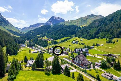 an aerial view of a village in the mountains at Pension Edelweiss in Gargellen