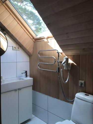 a bathroom with a shower and a sink at Beautiful view in Nida