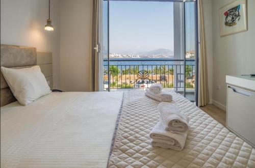 Postel nebo postele na pokoji v ubytování Hotel Vila Kalcuni Sarande