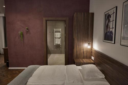 Una cama o camas en una habitación de Hótel Vesturland