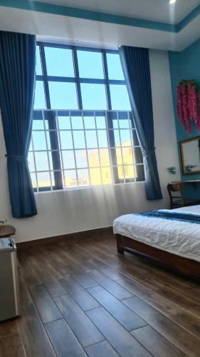 Postel nebo postele na pokoji v ubytování LẠI NGUYỄN BOUTIQUE HOTEL