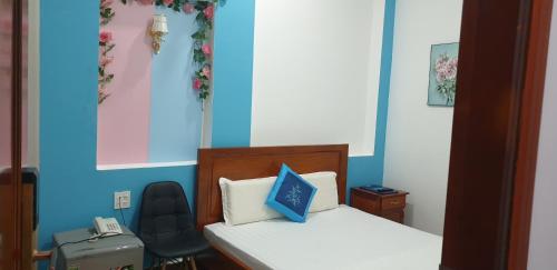 Postel nebo postele na pokoji v ubytování LẠI NGUYỄN BOUTIQUE HOTEL