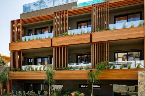 an architectural rendering of a building with balconies at Utopia Luxury Suites in Platanes