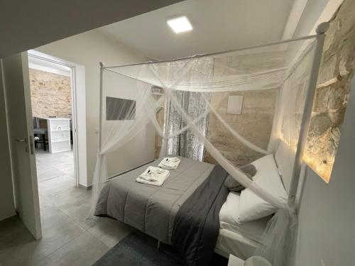 Postel nebo postele na pokoji v ubytování SiricyAus Luxury Room