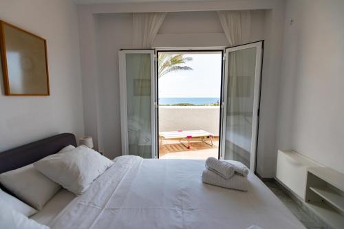 Ліжко або ліжка в номері Casa 1 Linea de Playa.
