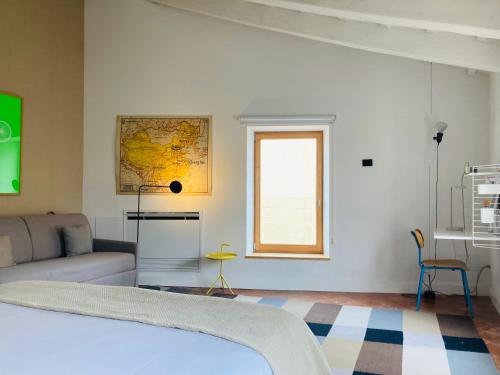 Hotel Hevresac Singular & Smallにあるベッド