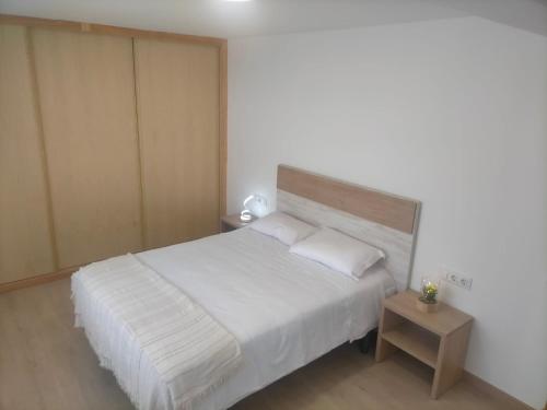 Postel nebo postele na pokoji v ubytování Alojamiento Costas Bueu