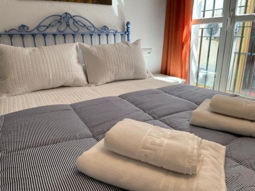 Posteľ alebo postele v izbe v ubytovaní Apartamento Duplex El Tinte