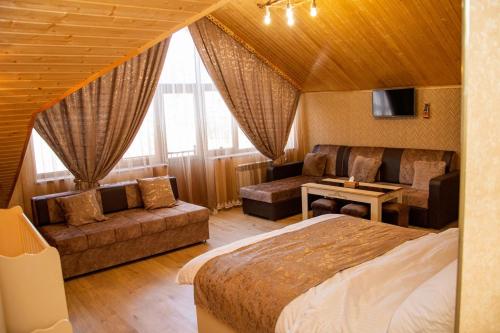 Postel nebo postele na pokoji v ubytování Har-Mar Hotel