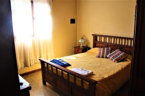 Postel nebo postele na pokoji v ubytování Kalimera (Buenos Días)