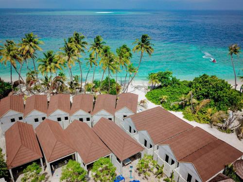 an aerial view of a resort on the beach at Sabba Beach Suite , Fodhdhoo - Maldives in Velidhoo